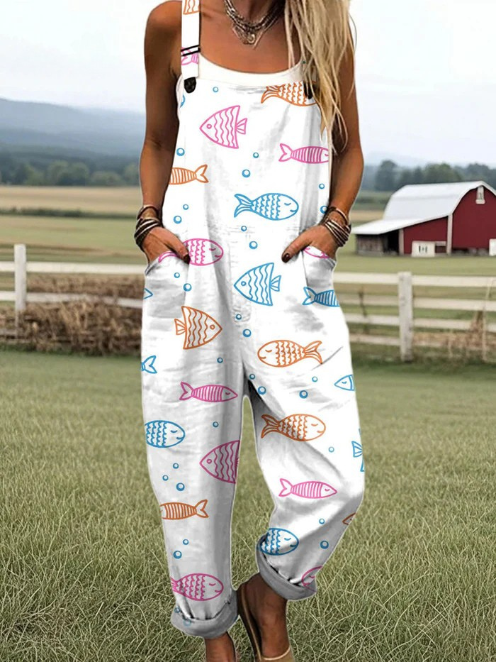 Ocean Whimsy jumpsuit for women, white with colourful fish print, relaxed fit, sizes AU 8-24